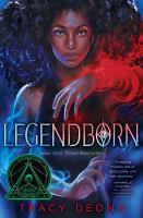 The cover for Legendborn. A teen girl with dark skin and curly hair stands facing the reader. She is forming a circle with her arms. The left arm is covered in blue, fire like energy, while the right arm has the same energy colored red. 