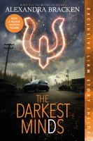 The cover of The Darkest Mind. A car is pulled over on an abandoned street. Above it, a horseshoe like symbol, with a diamond cutting through the center, burns in the sky.