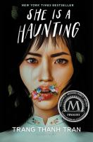 The cover of She is a Haunting. A teen girl with pale skin and dark hair stares out at the reader. Tears run down her cheeks, and her mouth is full of flowers. 